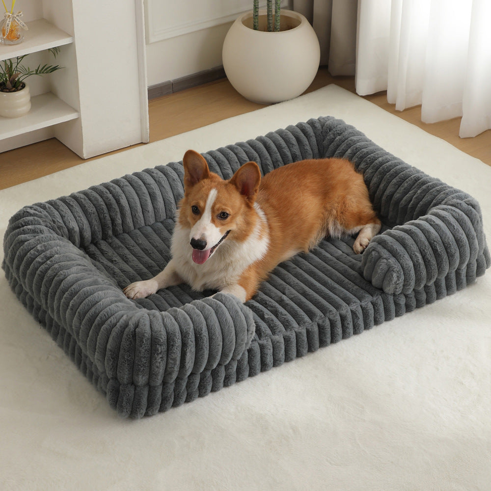 Corgi tumbado en la Cama Sofá Nube gris
