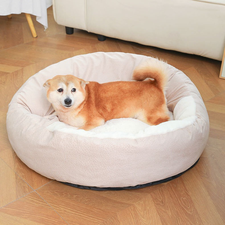 Perro tumbado en la Cama Nido beige (foto del fabricante, no indica la talla)